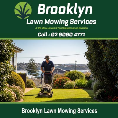 Professional lawn mowing service in Brooklyn NSW with landscaper maintaining residential garden