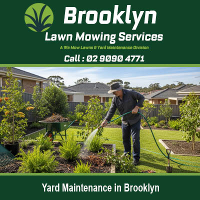 Yard maintenance in Brooklyn NSW with gardener watering plants and flowers in residential garden